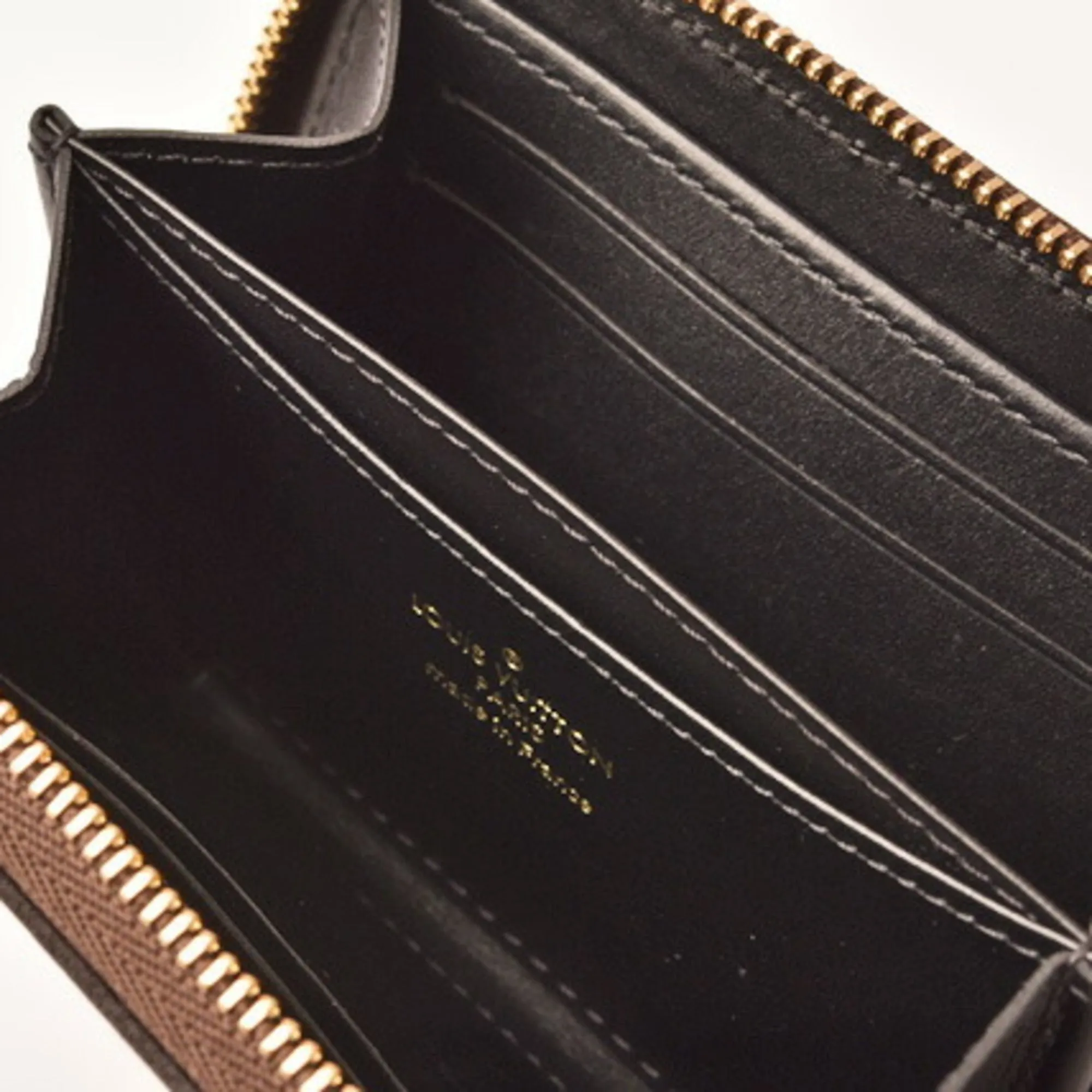Louis Vuitton Coin Purse Card Case Isetan Store Limited LOUIS VUITTON Folded Wallet Zippy Trunk Time M63834